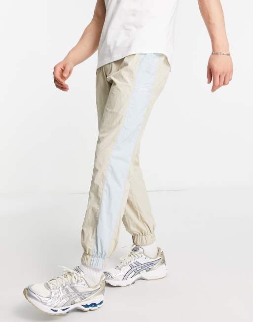 Tommy Jeans nylon blend trackies in beige - BEIGE