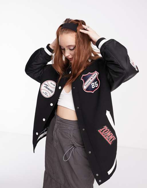 Tommy Jeans oversized letterman jacket in black | ASOS