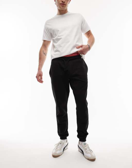 Tommy Jeans - Pantalon de jogging ajusté à logo - Noir