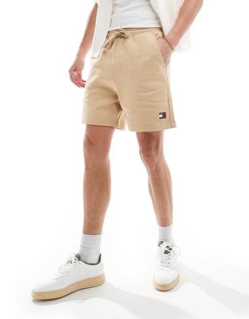 Tommy Jeans - Pantaloncini beige in jersey con stemma del logo