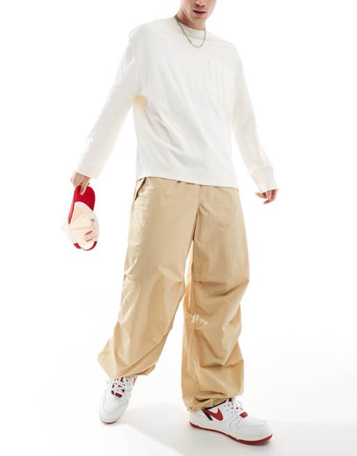 Tommy Jeans - Pantaloni beige in nylon stile paracadutista