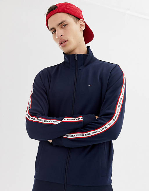 Tommy Jeans regular fit track jacket with sleeve taping in navy | ASOS