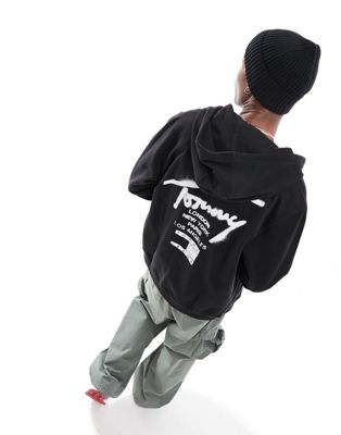 Tommy Jeans regular spray paint logo hoodie in black