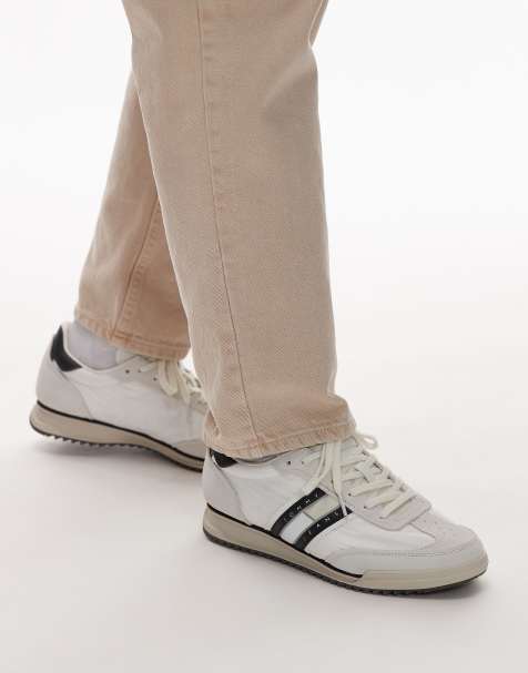 Tommy Jeans – Retro Runner Cleat – Sneaker in Weiß und Schwarz - view 1