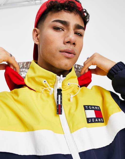 CHAQUETA TOMMY HILFIGER CORTAVIENTOS CON CAPUCHA HOMBRE - Johana Manchola  Boutique