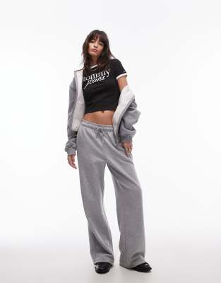Tommy Jeans - Ringer-T-Shirt in Schwarz mit Schriftzug in Weiß