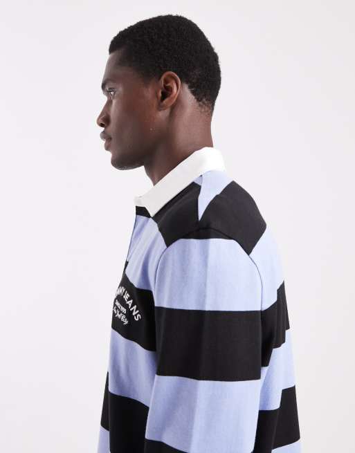 Tommy Jeans - Ruimvallend gestreept rugbyshirt met logo in blauw, 4 van 5