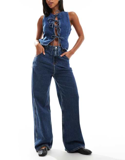 Tommy Jeans - Ruimvallende jeans met lage taille in mid-wash