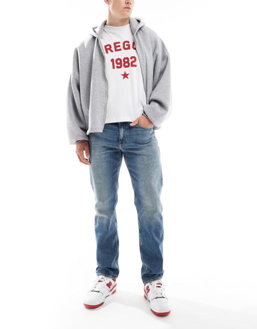 Tommy Jeans - Ryan - Jeans med lige ben i slidt mellemvask i Regular Fit