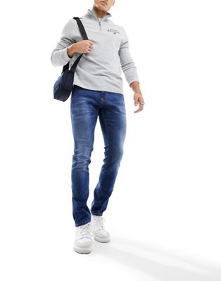 Tommy Jeans Scanton slim jeans in mid blue - ASOS Price Checker