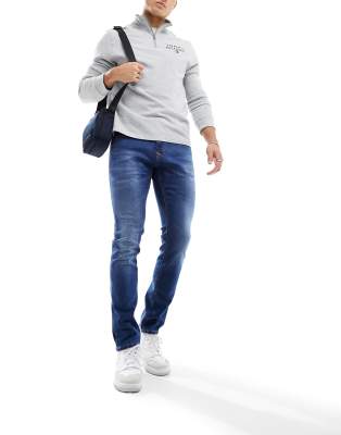 Tommy Jeans – Scanton – Niebieskie dopasowane jeansy