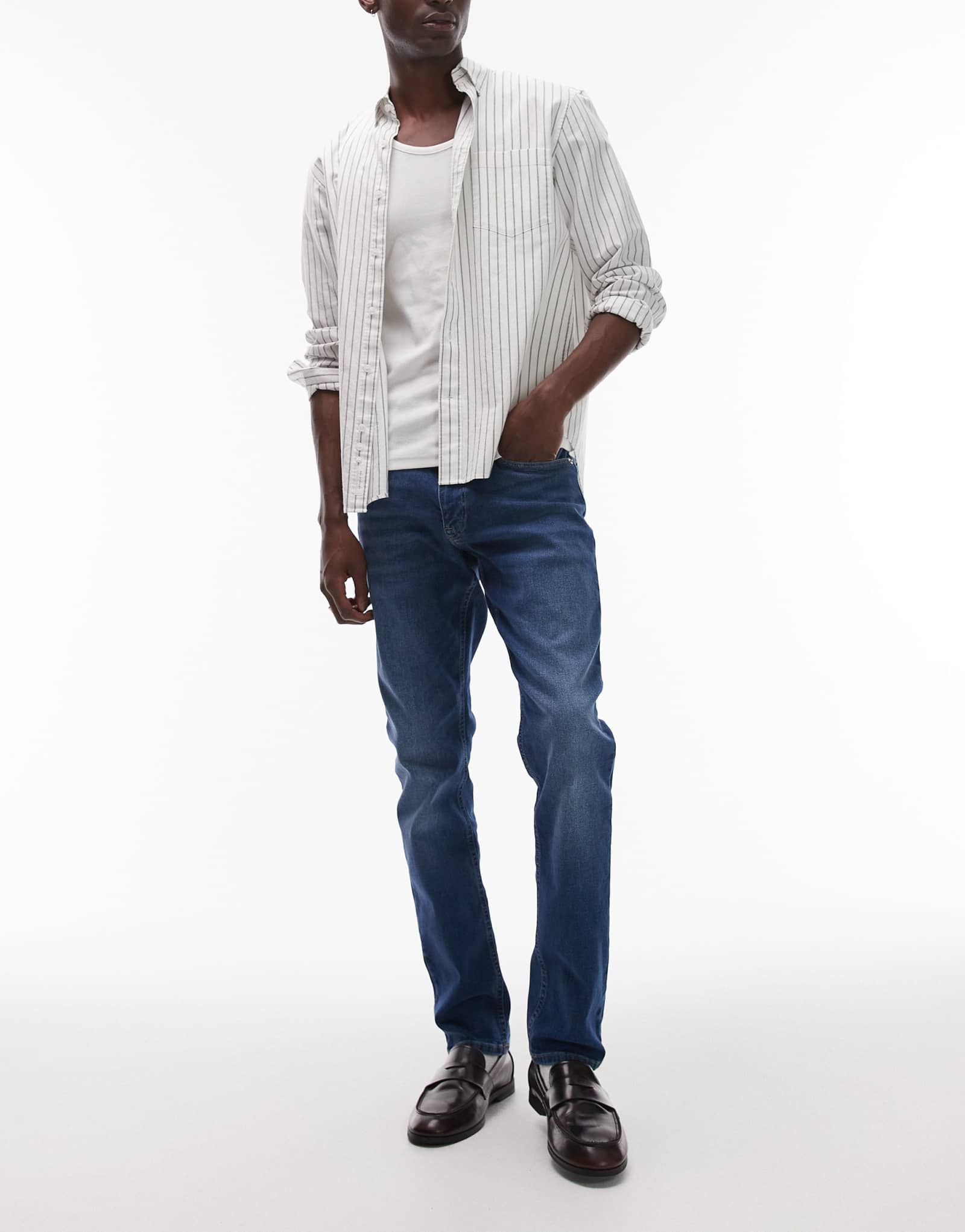 Зауженные джинсы Tommy Jeans Scanton темно-синего цвета с эффектом стирки