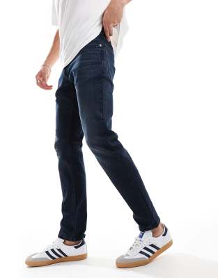 scanton slim jeans in dark denim wash-Navy