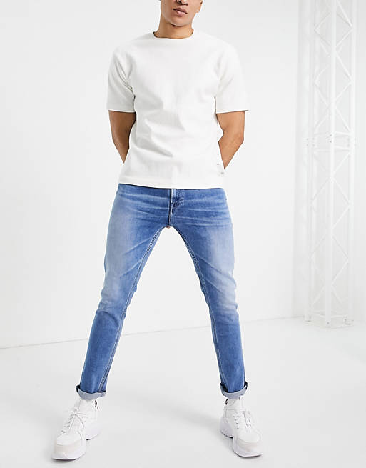 richting bijgeloof Thespian Tommy Jeans Simon skinny fit jeans in stark light wash | ASOS