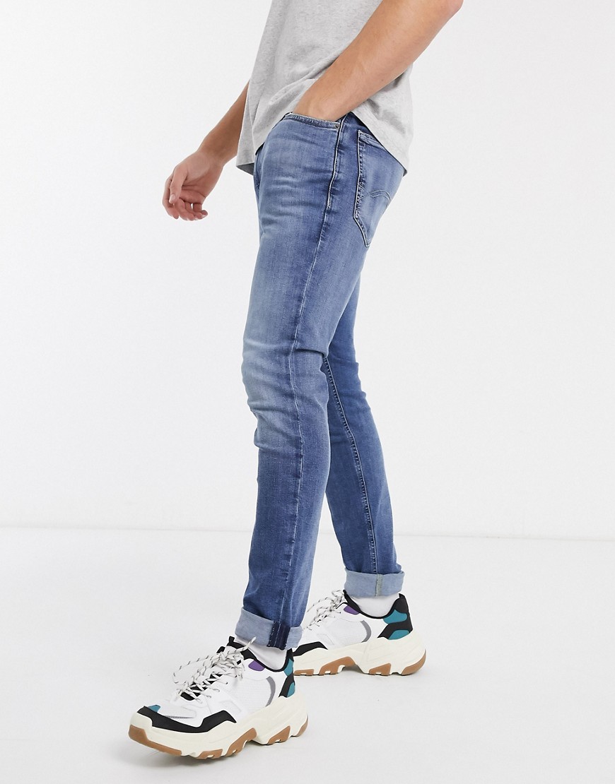 Tommy Jeans simon skinny jeans in mid blue