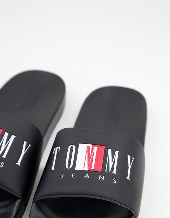 https://images.asos-media.com/products/tommy-jeans-sliders-with-text-logo-in-black/23607643-2?$n_550w$&wid=550&fit=constrain