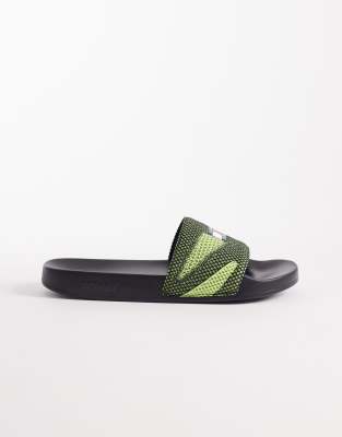 Tommy Jeans slides with logo in green lime essenceblack 12790₽