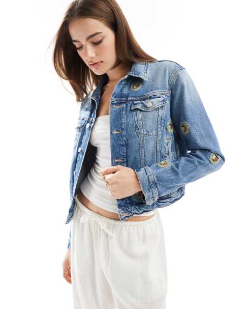 Tommy Jeans slim denim jacket in mid wash with crest logos - view 1