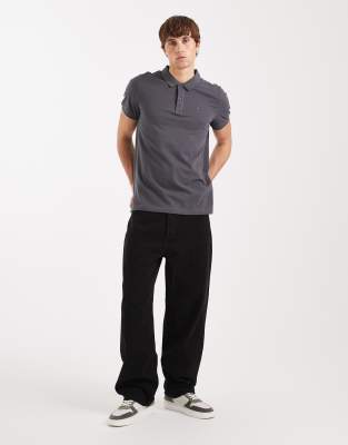Tommy Jeans Slim Placket Short Sleeve Polo Shirt In Black