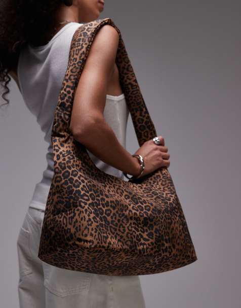 Tommy Jeans slouchy shoulder bag in leopard print - view 1
