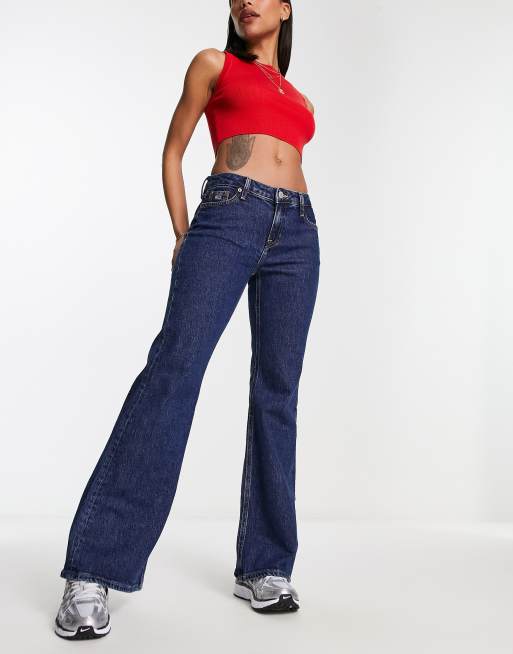 wash jeans Sophie mid rise Tommy flare low in | ASOS Jeans