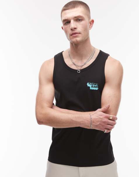 Tommy Jeans stack logo tank top in black - view 1