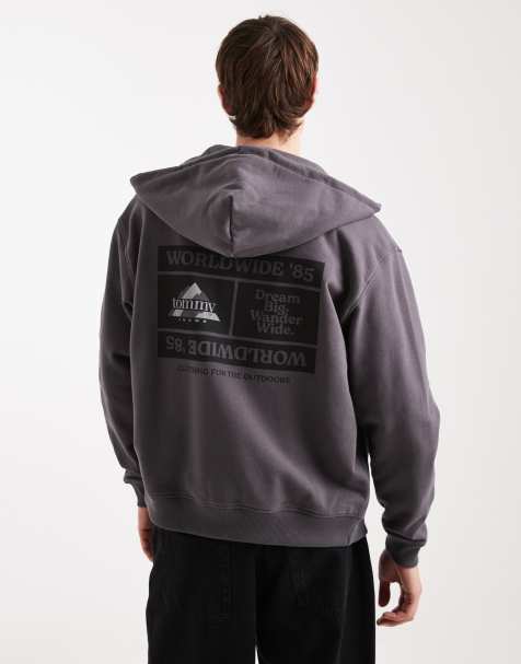 Tommy Jeans stacked graphic logo zip up hoodie in washed black - view 1