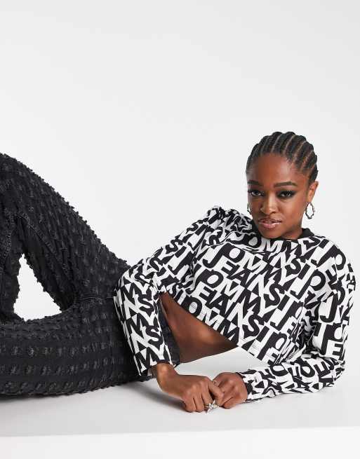 Tommy Jeans - Super crop top met lange mouwen en monogramprint