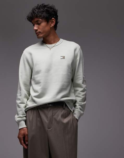 Tommy Jeans – Sweatshirt in Salbeigrün mit kleinem Aufnäher - view 1