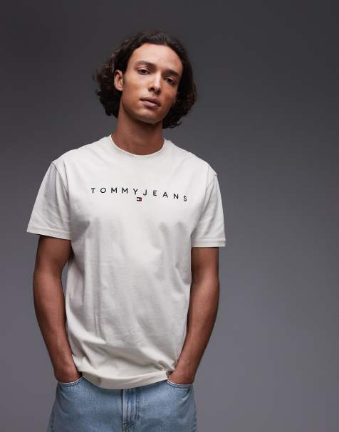 Tommy Jeans – T-Shirt in Beige mit linearem Logo - view 1
