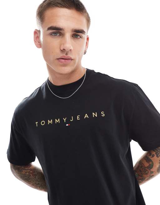 Tommy Jeans – T-Shirt in Schwarz mit goldenem, linearem Logo