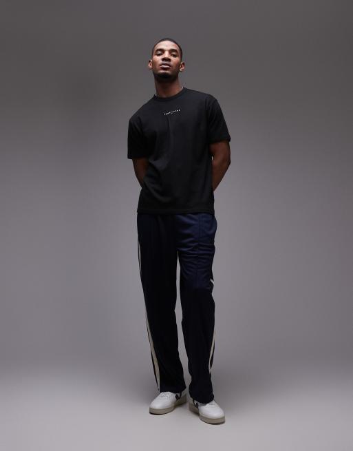 Tommy Jeans – T-Shirt in Schwarz mit kleinem, linearem Logo, 3 von 4