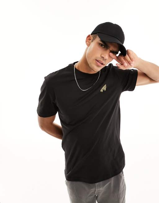 Tommy Jeans – T-Shirt in Schwarz mit Signatur-Logo in Gold