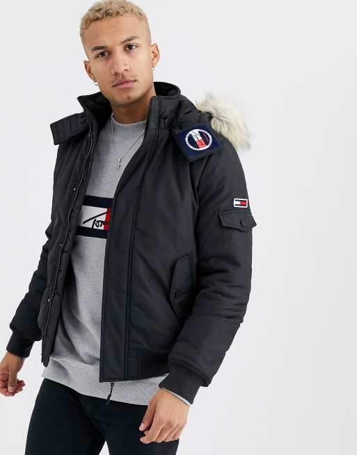 Tommy Jeans technical quilted bomber in black with faux fur trim and sleeve logo