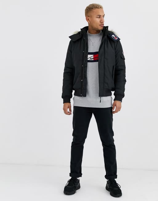 Tommy Jeans technical quilted bomber in black with faux fur trim and sleeve logo