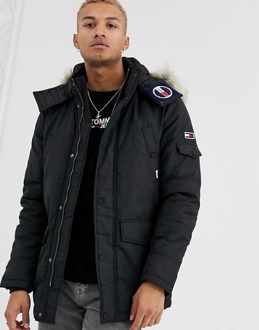 Tommy Jeans technical quilted parka in black with faux fur trim and sleeve logo