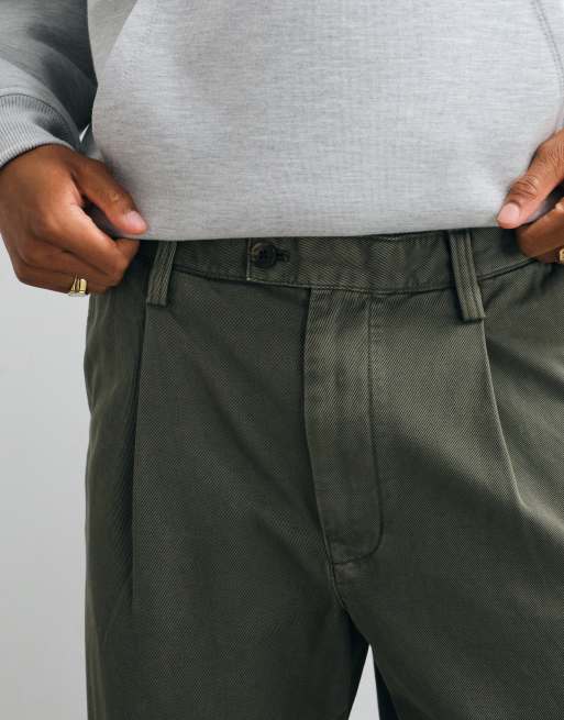 Tommy Jeans Theo Baggy-Fit Chinohose in Khaki mit Waschung, 4 von 5