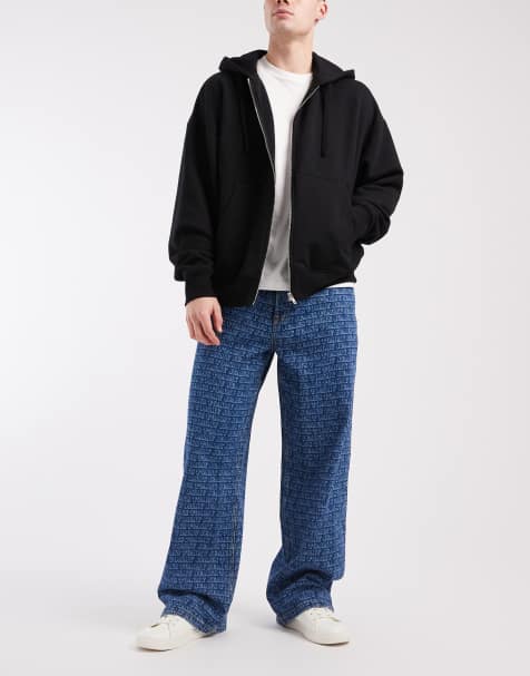 Tommy Jeans Theo baggy jeans with all over print in mid wash blue 