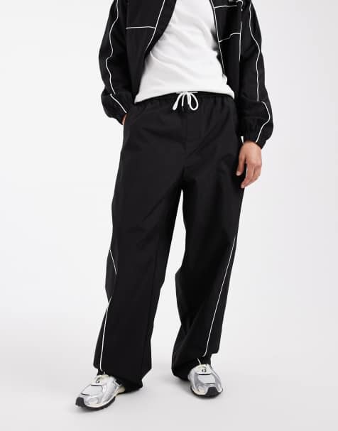 Tommy Jeans - Theo - Parachute-trainingsbroek met biezen in zwart - view 1