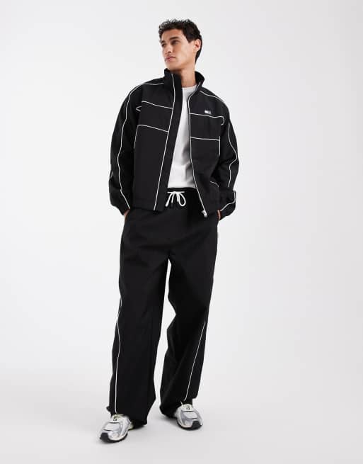Tommy Jeans Theo piping detail parachute track pants in black , 2 of 5