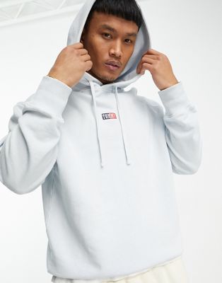 Tommy Jeans tiny centre flag logo hoodie in blue  - ASOS Price Checker