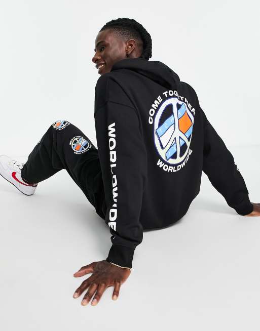 Tommy Jeans - Together World Peace - Sort hættetrøje med print på ryggen i afslappet pasform