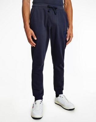 Tommy Jeans tonal flag logo cuffed joggers in navy