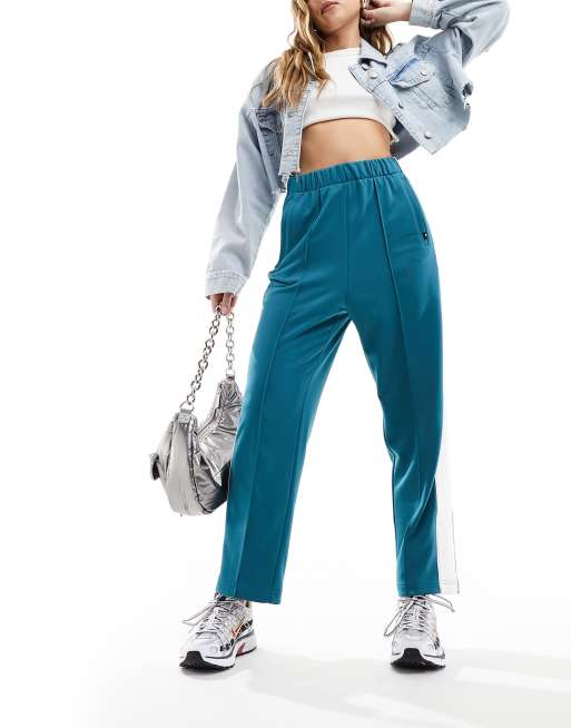 Tommy Jeans – Turkosa träningsbyxor i collegestil, 4 av 5