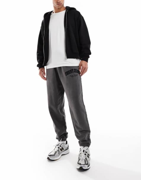 Tommy Jeans Varsity washed relaxed joggers in grey - view 1
