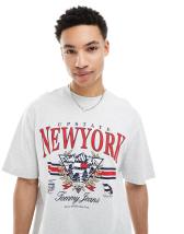 Tommy Jeans arch varsity logo T-shirt in navy | ASOS