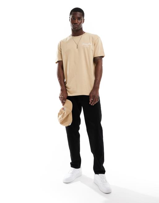 Tommy Jeans vintage graphic back print T-shirt in beige | ASOS
