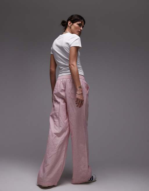 Tommy Jeans – Weite, rosa-weiß gestreifte Hose aus Leinen, 4 von 5