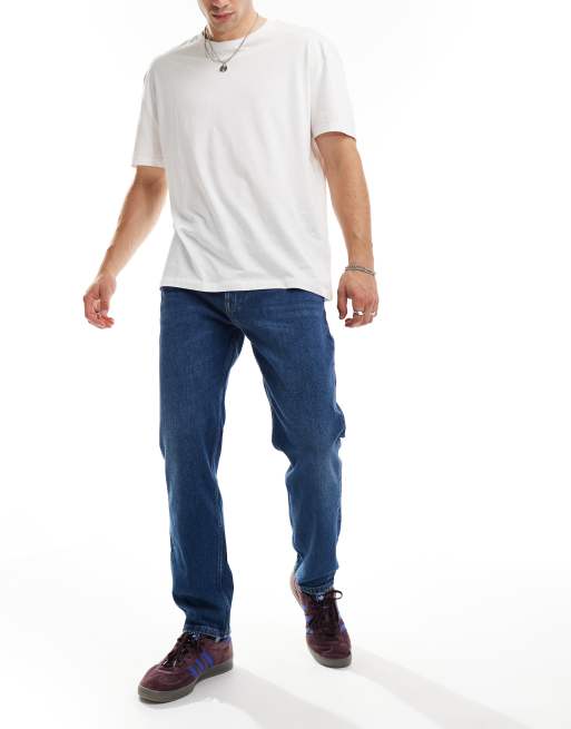 Tommy Jeans – Whiskered – Schmal zulaufende Dad-Jeans in Blau mit normalem Schnitt