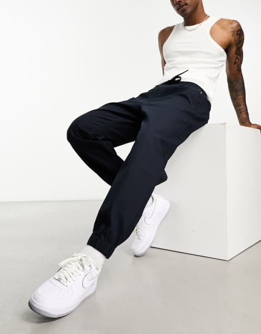 Tommy Jeans – Windpants – Hose aus Cord in Blau
